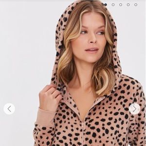 Forever 21 Brand New in package. Women’s Cheetah Onesie with hood
